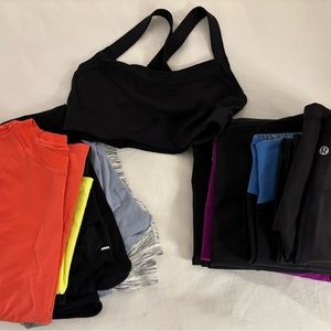 14 piece LuluLemon lot - 5 pants, 1 bike shorts, 1 bra, 7 tops.